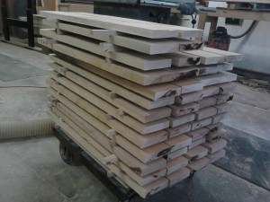 Lumber cut to rough lengths, ready for milling.