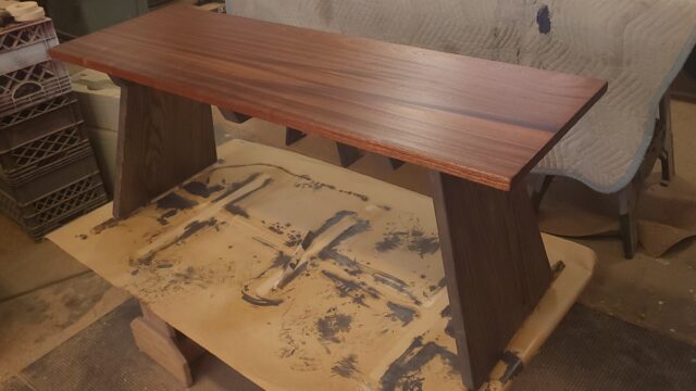 "Flying buttress bench". Sapele top with ash base.